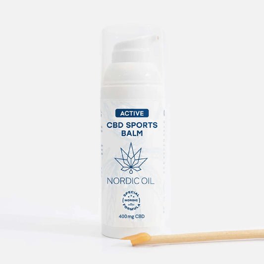 Bálsamo deportivo con CBD Active CBD Sports Balm de Nordic Oil, envase blanco con etiqueta azul