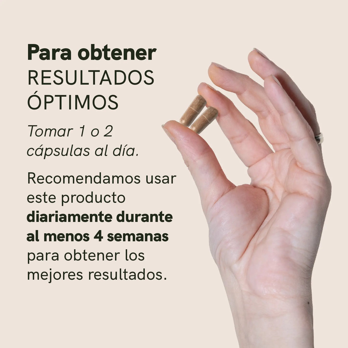 Mano sosteniendo dos cápsulas frente a un fondo beige, con texto promocional en español sobre resultados óptimos.